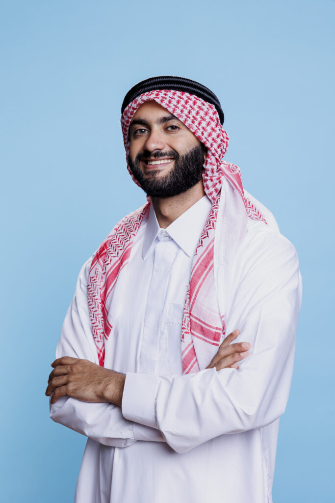 muslim man wearing ghutra and robe muslim man wearing ghutra and robe